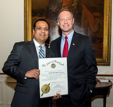 two attorneys holding a certificate